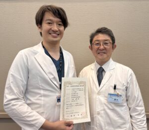 研究課題採択の報告を行う三邉講師（左）と野村武史教授（右）